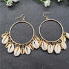 Boucles d'Oreilles Cauris Or Et Blancs Afrique